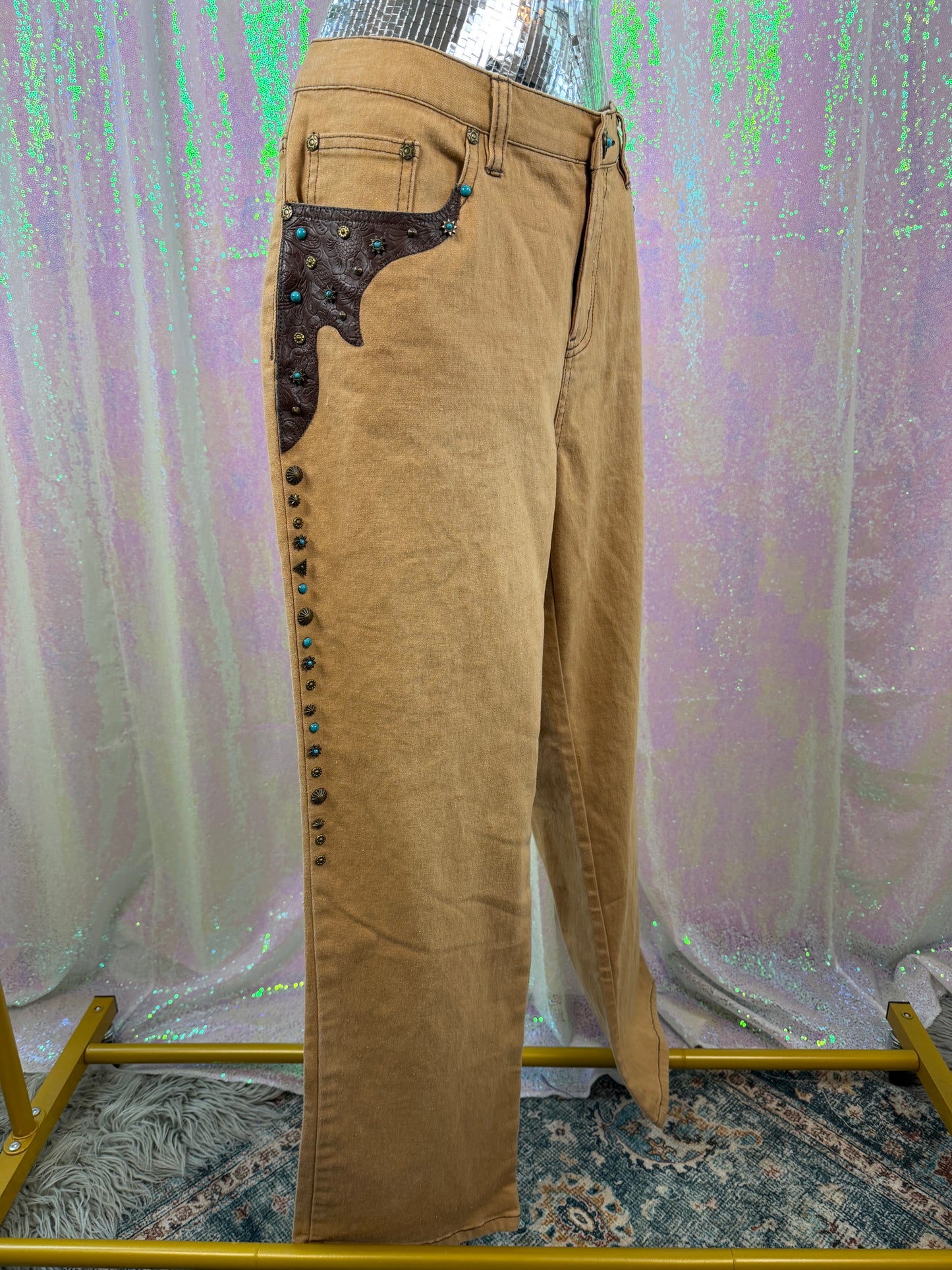 DG² by Diane Gilman (XL+) 🤠🤎🐎🪶 western Texas rancher cowboy rodeo rider embossed paisley leather with turquoise and brass studded embellishments on light brown tan straight leg pants denim jeans (factory tagged: 12P)