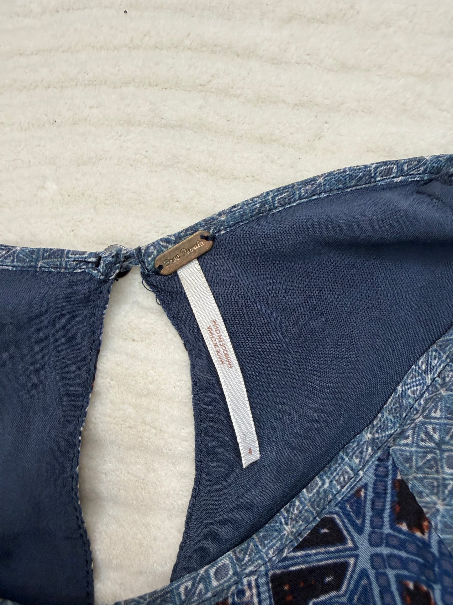 Free People (S) 🌀🫐🌿🧿 mixed-print boho mini dress, washed indigo + slate with earthy accents, folk revival / soft grunge / art-girl layering (factory tagged: XS)